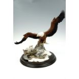 A limited edition Country Artist's eagle and chicks figurine, 42 cm
