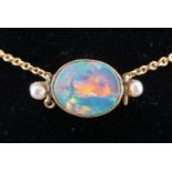 A late 19th / early 20th Century opal, seed pearl and yellow metal necklace, (a/f), opal 9 mm x 11