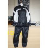 A lady's leather motorcycle jacket, size 40, together with size 38 trousers and Kevlar Gore-Tex