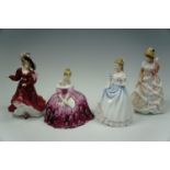 Four Royal Doulton figurines: Patricia, Sharon, Claire and Victoria, the tallest 23 cm