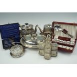 A quantity of Victorian and later electroplate including two tea pots and two cased sets of