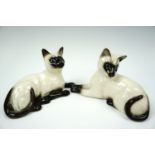A pair of Royal Doulton Siamese cats, 12 cm