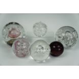 Six controlled bubble paperweights