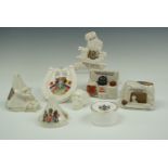 Great War crested china bell tents, a skull etc