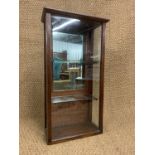 A late 19th / early 20th Century small shop counter-top display cabinet, having glass shelves and