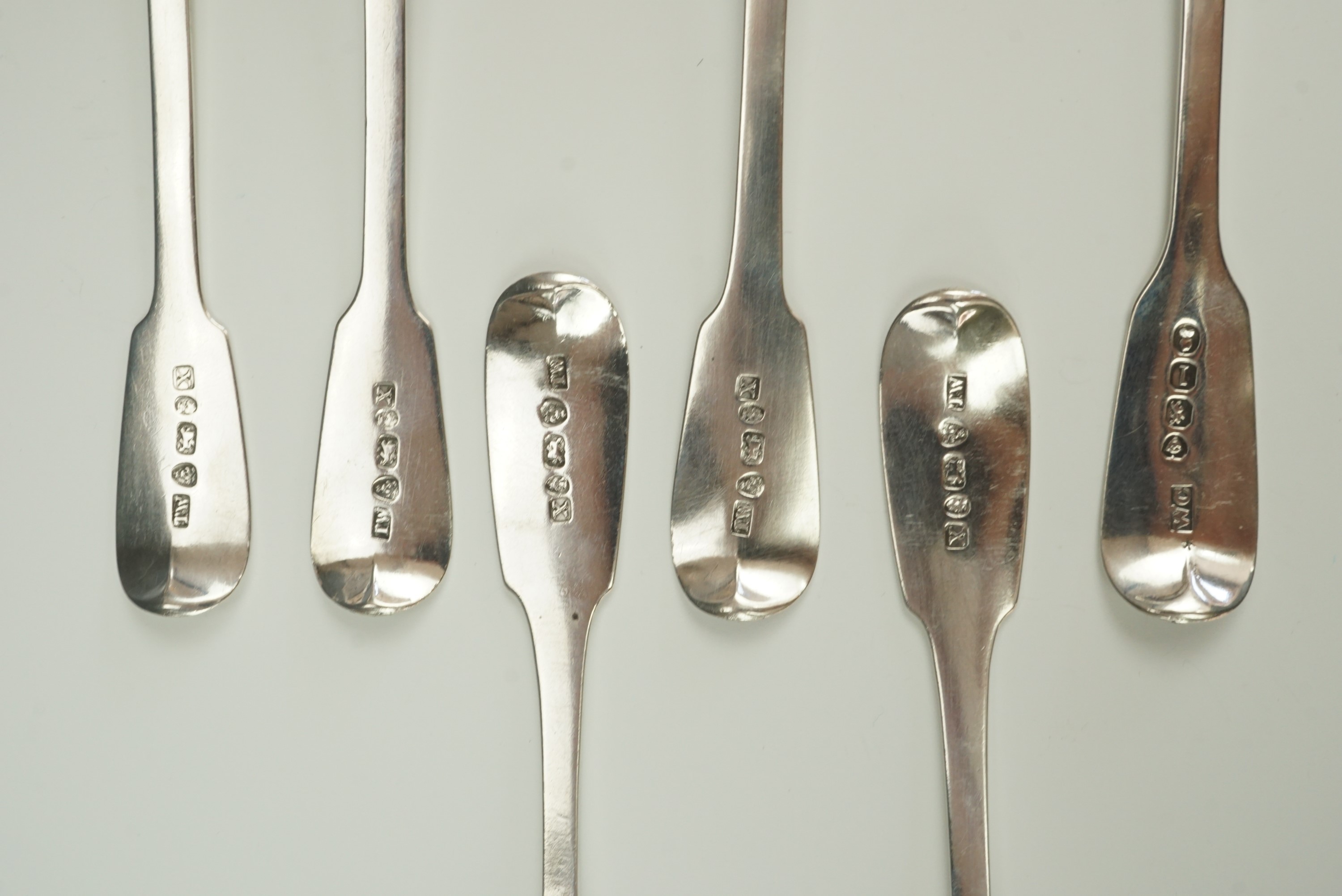 Five Georgian silver fiddle pattern tea spoons, Thomas Wheatley, Newcastle, 1836, with one other - Image 3 of 3