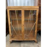 A 1930s Art Deco walnut display cabinet, 89 cm x 30 cm x 125 cm