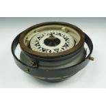 A large marine gimballed binnacle compass, the rose marked "H.F.V.O.T, Hull", 30 cm diameter