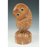 A carved wooden owl, 24 cm
