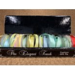 A box of vintage new old shop stock ''The Elegant Touch'' gift wrapping ribbons