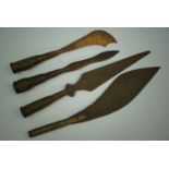 Three Great War trench art paper knives with rifle cartridge handles, together with one other in the