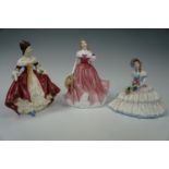 Three Royal Doulton figurines, tallest 21 cm