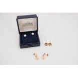 A pair of contemporary pearl and 9 ct gold stud earrings, 6 mm, together with 9 ct gold flowerhead