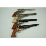 Four inert replica Colt pistols