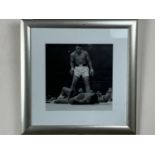 [ Boxing ] A framed picture of Muhammad Ali fighting Joe Frazier, 46 x 46 cm