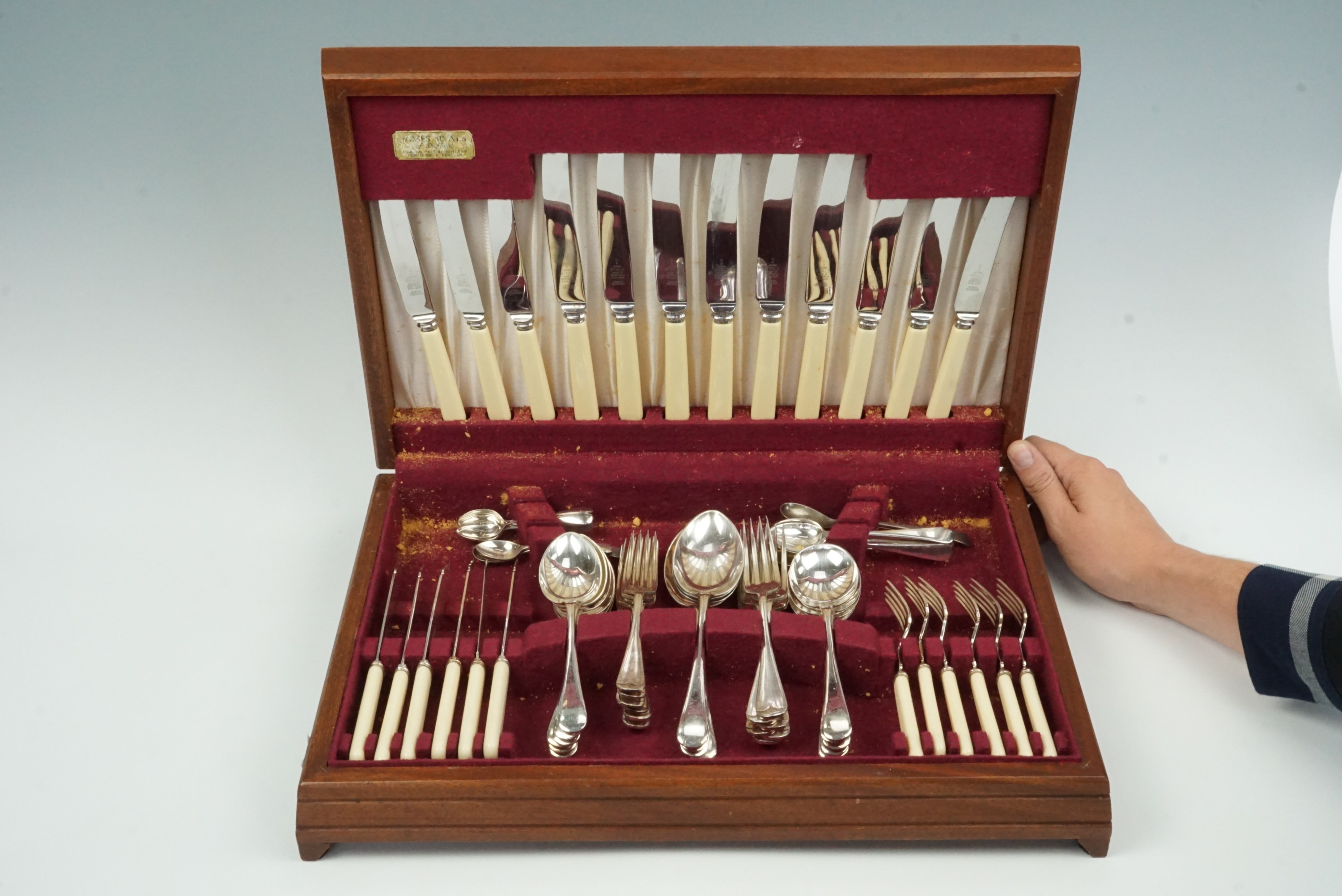 A James Ryals canteen of cutlery together with two carving sets
