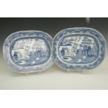 A pair of 19th Century willow pattern earthenware ashets, impressed anchor marks, second quarter