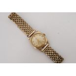 A 1950s Record 9 ct gold wristwatch, having a 15 jewel movement and frosted silvered face with