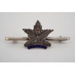 A Great War Canadian Machine Gun Corps enamelled white metal sweetheart brooch, (stamped Sterling