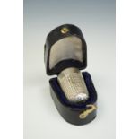 A cased Edwardian silver thimble, James Fenton & Co, Birmingham, 1907