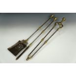 Victorian brass and iron hearth implements, longest 73 cm