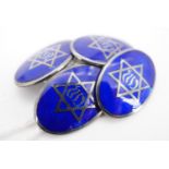 A set of vintage enamelled white metal Star of David cuff links, circa 1940s