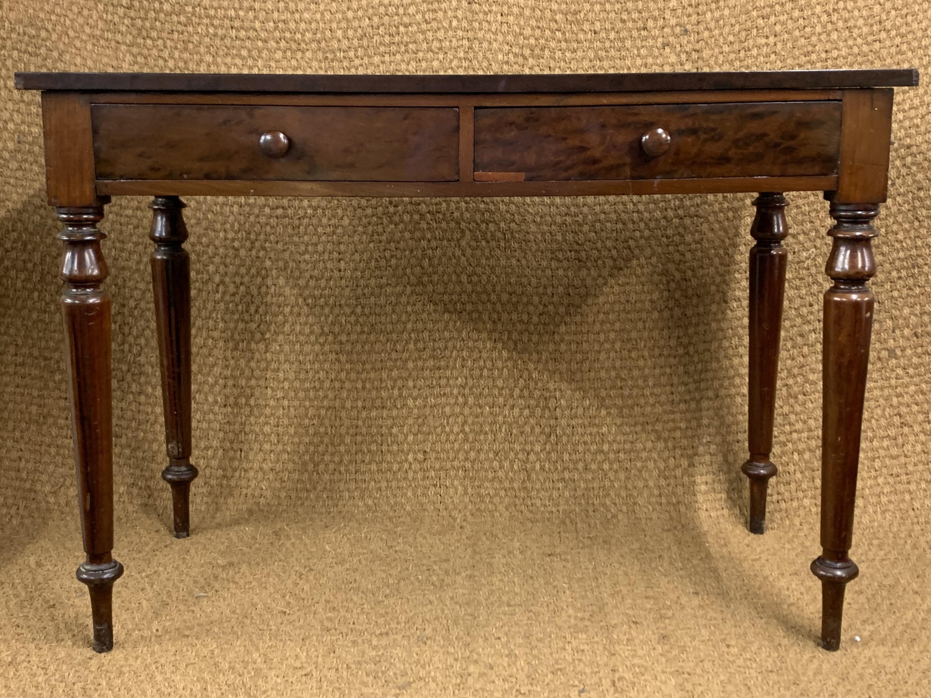A Victorian plum pudding mahogany writing table, 11 cm x 52 cm x 78 cm
