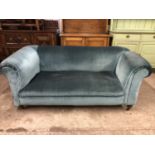 A late 19th / early 20th Century drop-arm sofa, 180 cm wide, 76 cm high, 86 cm deep, seat 45 cm high