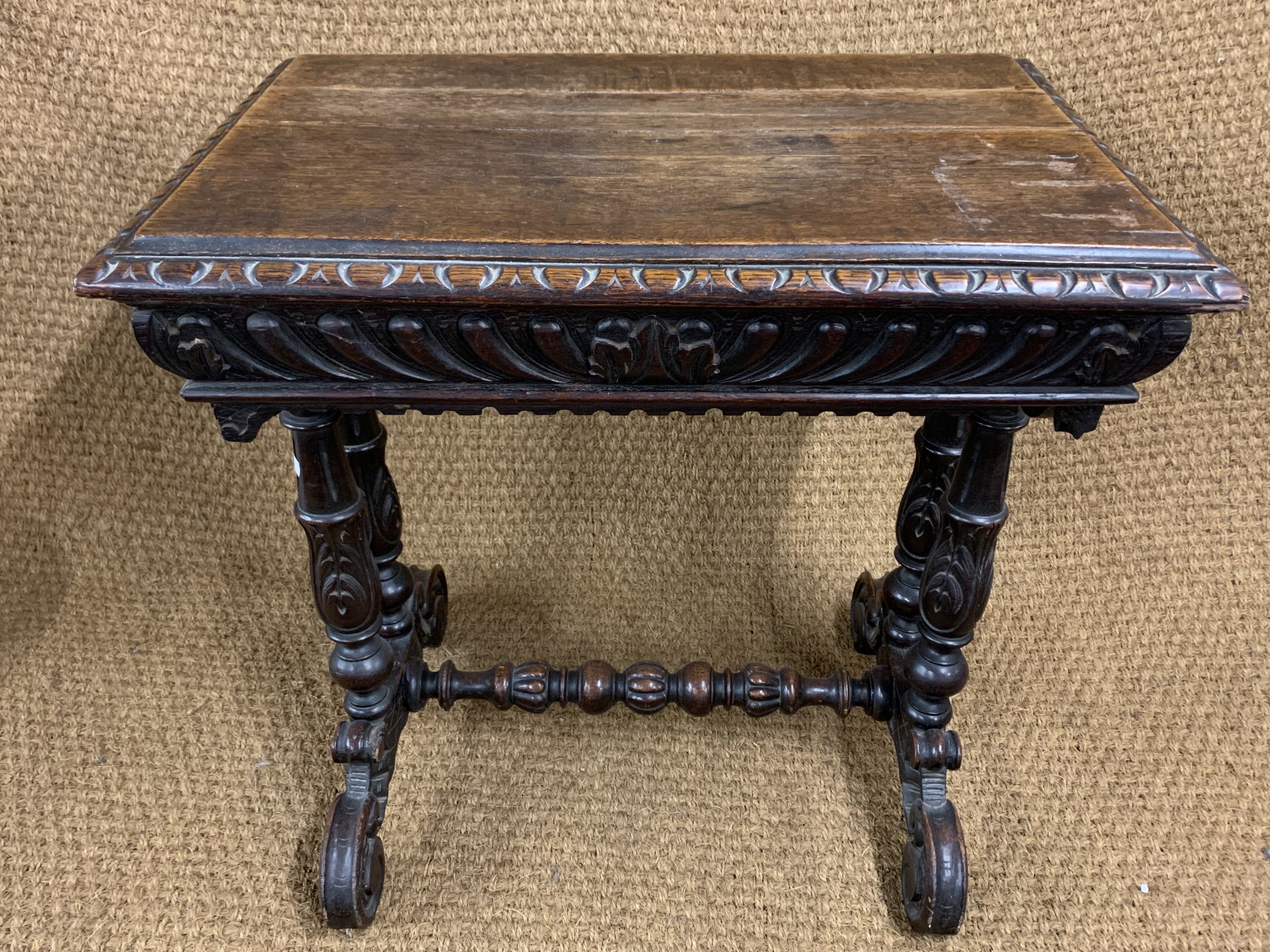 A late Victorian Flemish style heavily carved oak writing table, 74 cm x 62 cm x 73 cm - Image 2 of 3