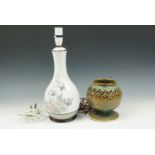 A ceramic baluster-form table lamp base together with a pottery reticulated lamp