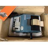 A vintage Olivetti Prima 20 adding machine in original box with instructions