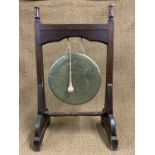 A Victorian oak and brass floor-standing dinner gong, 99 cm