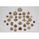 A quantity of Great War Canadian cap and other badges