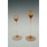 A pair of Wedgwood Sandringham Topaz candle sticks, tallest 22 cm
