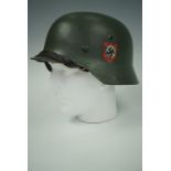 A German M 1940 steel helmet with spurious decals