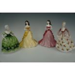 Four Coalport figurines, tallest 22 cm