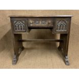 A Gothic-influenced oak kneehole desk, circa 1930s, 91 cm x 50 cm x 75 cm