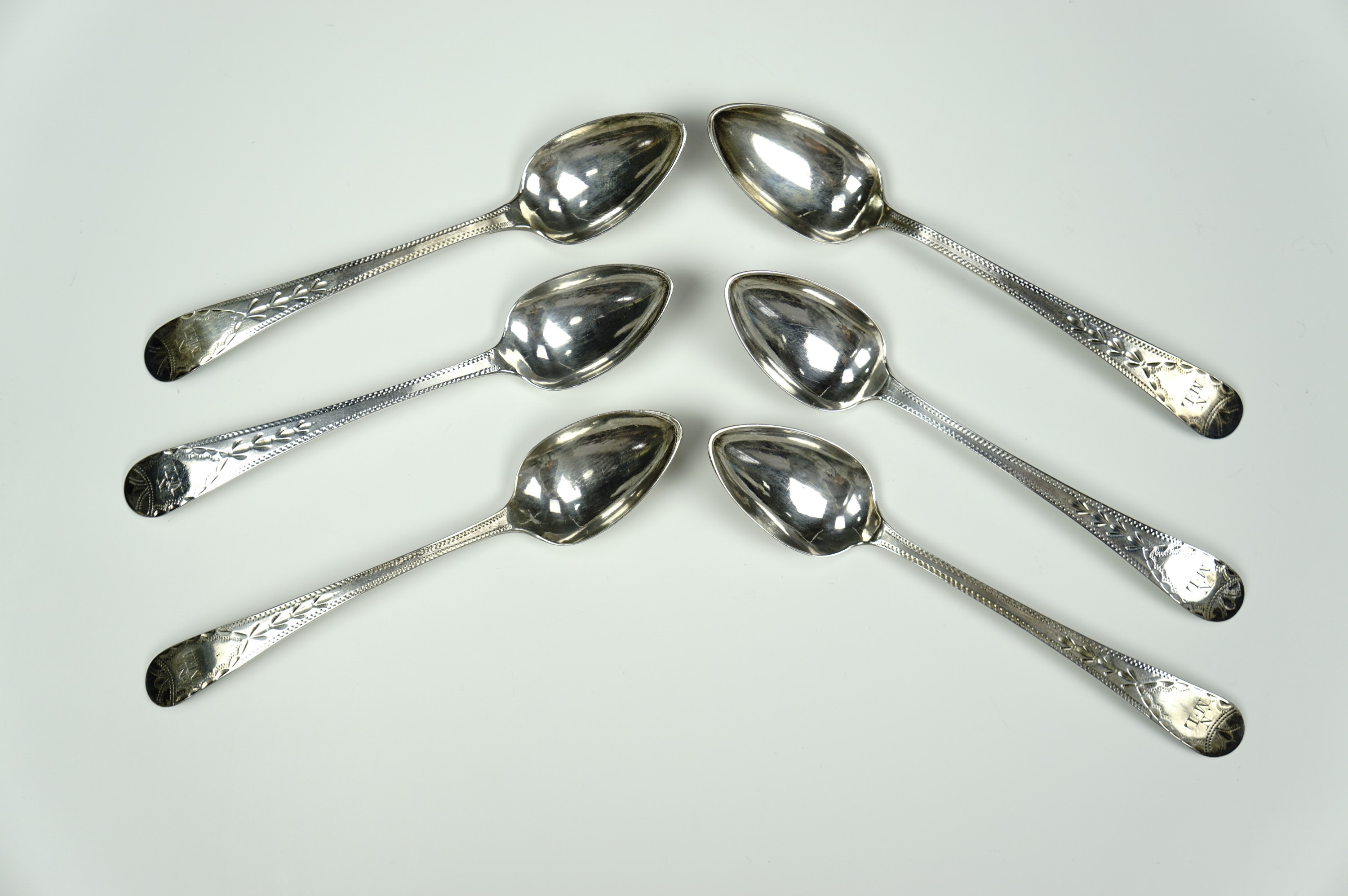 A set of six Georgian bright-cut silver tea spoons, Thomas Wheatley (Carlisle), Newcastle, 62 g