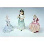 Two Royal Doulton figurines, "Home at Last" and "Dinky Do", tallest 15 cm, together with a
