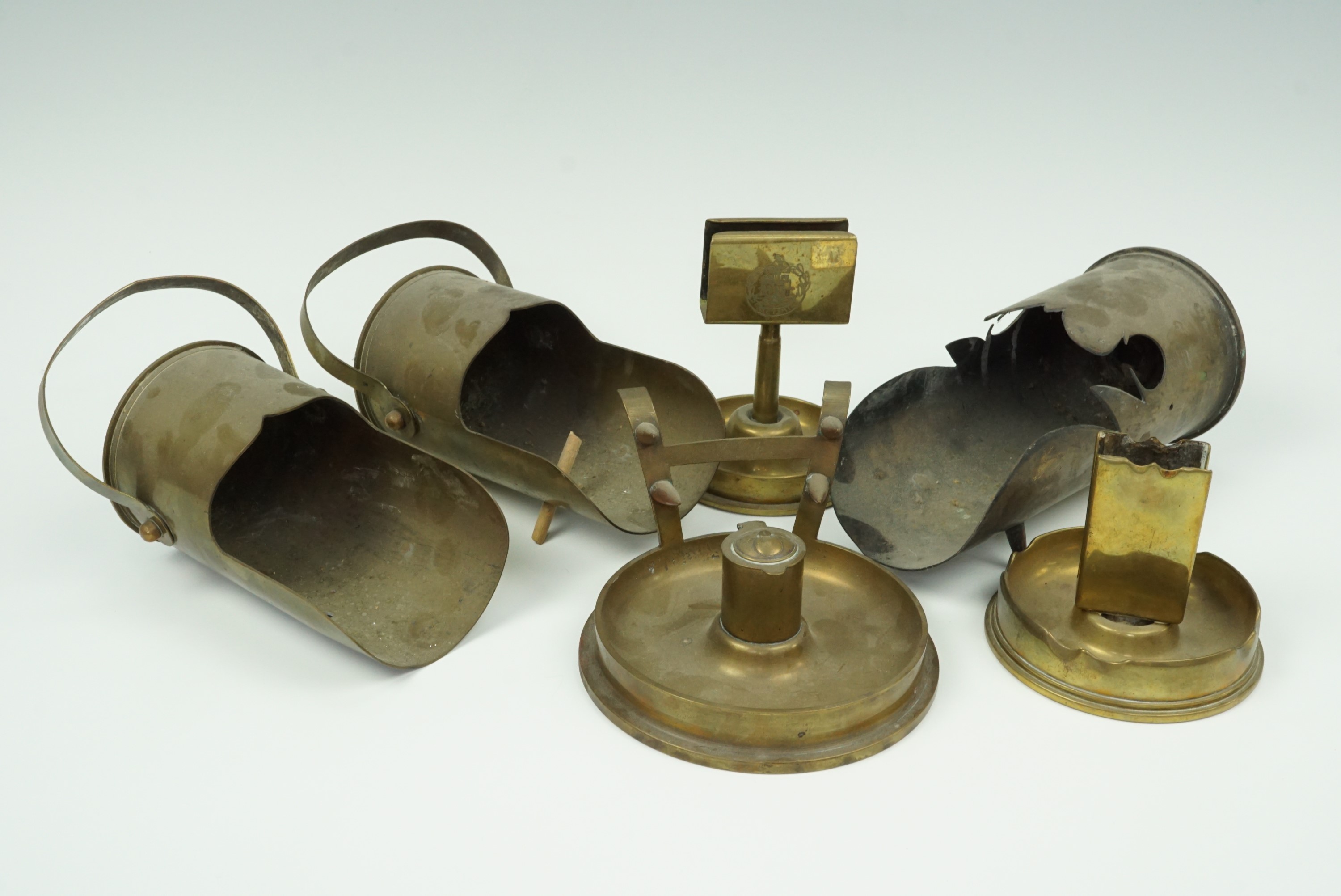 A group of trench art scuttles etc