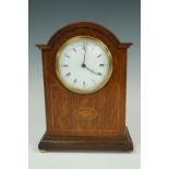 A French oak mantle clock, 23 cm wide