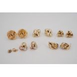 Five pairs of 9 ct gold and yellow metal (tested as gold) knot and interlaced earrings, 9 g