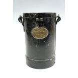 A steel cylindrical container bearing a brass plaque marked "1908 Imperial Light Class A No 27,