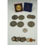 A small quantity of coins together with a George V fob medallion and a cased 1953 coronation