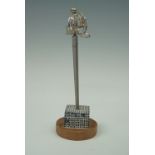A miniature Scottish highland basket-hilted broadsword and stand, 21.5 cm