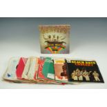 Single records including The Beatles' EP 'Magical Mystery Tour', Rolling Stones, Madness etc