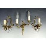 A pair of Baroque influenced brass and glass sconces, together with a Rococo example, 20 cm