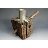 An early 20th century candle stick holder, by repute fabricated from timber salvaged from a Great