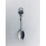 An enamelled silver Southport souvenir tea spoon