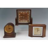 A Bentima Art Deco influenced oak mantel clock, circa 1930s - 1940s, 21 cm x 23 cm, together with